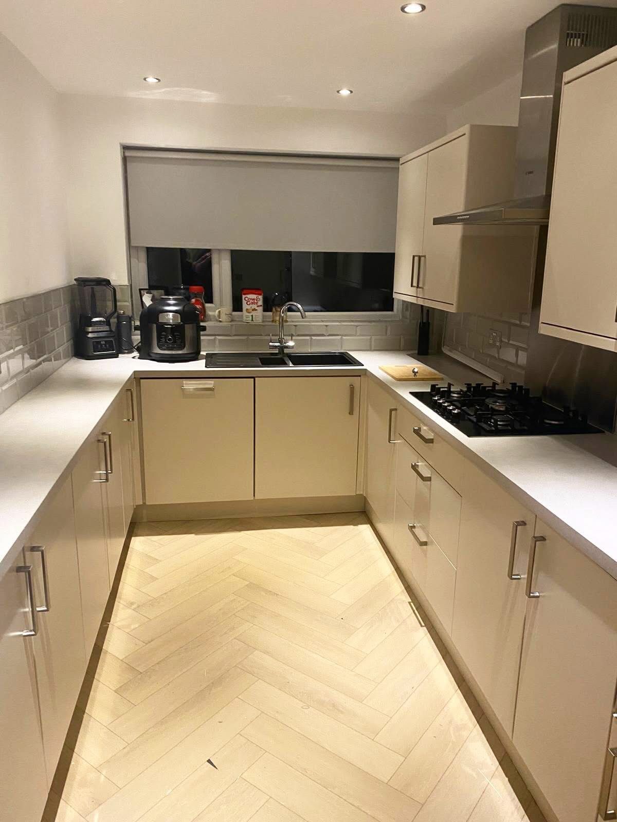 Kitchen after vinyl wrap transformation