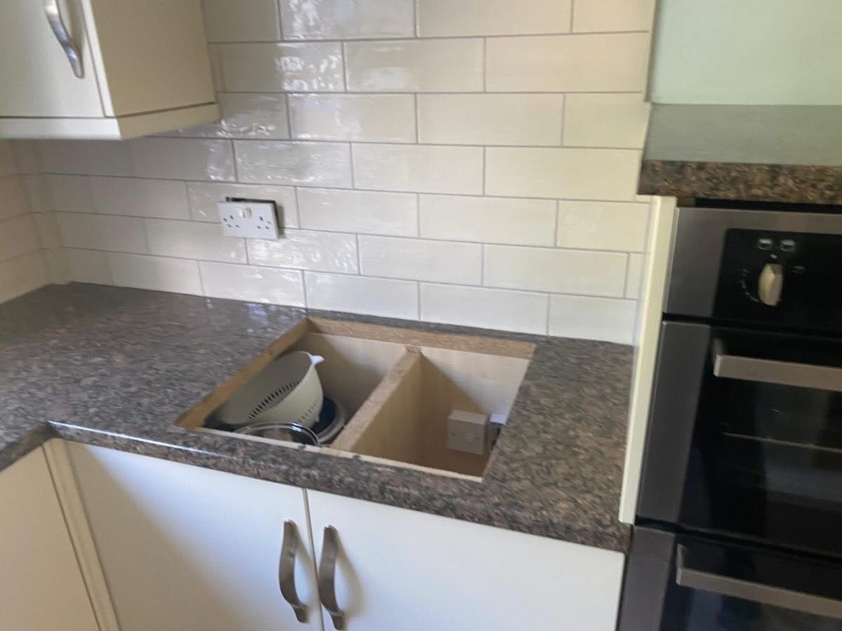 Worktop with sink cutout during installation