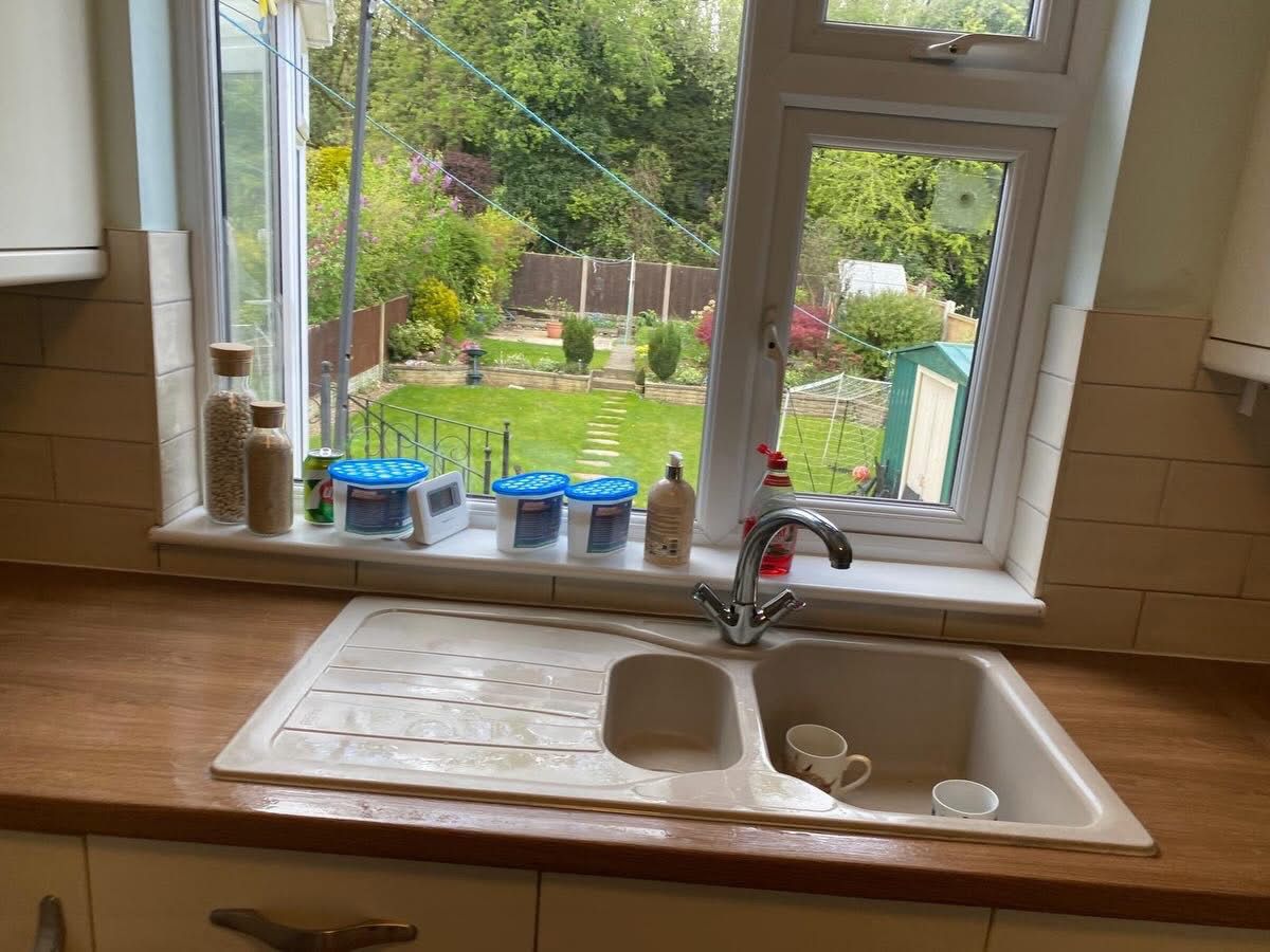 Original kitchen sink and worktop before transformation